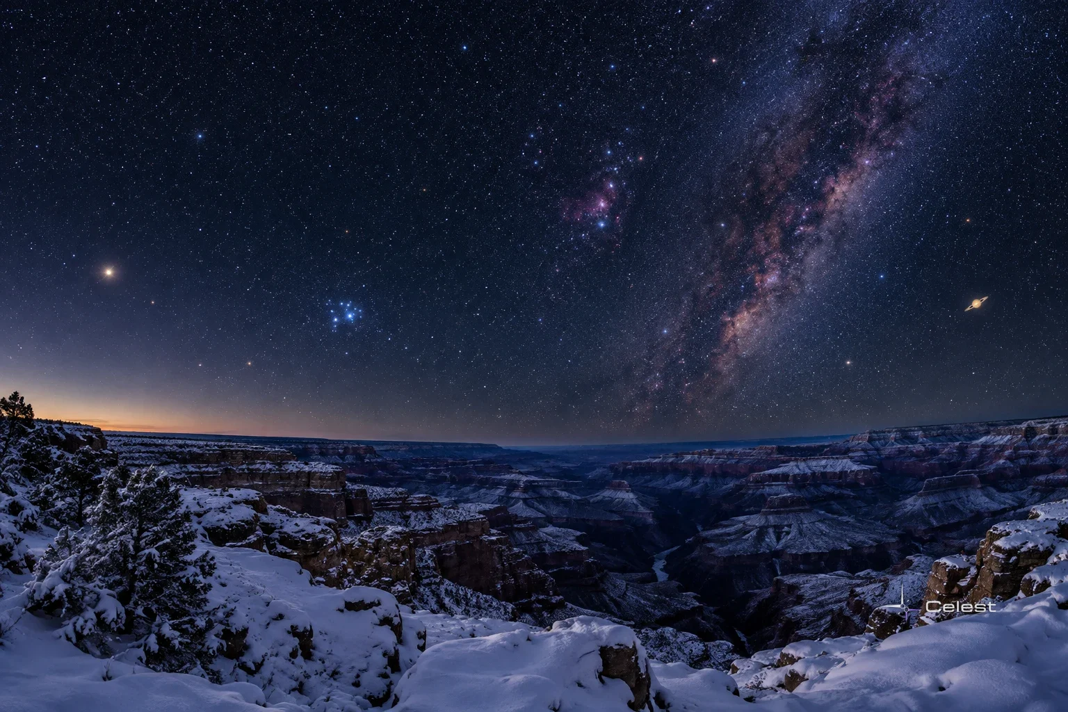 The Milky Way arcs over a snow-covered canyon at night, with the Pleiades cluster, Orion, and a bright planet glowing above the icy cliffs.